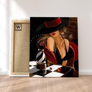 Première image de la peinture par numéro, Femme au Chapeau , dans un cadre en bois sur du parquet.