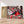 Première image de la peinture par numéro, Rouges Gorges , dans un cadre en bois sur du parquet.