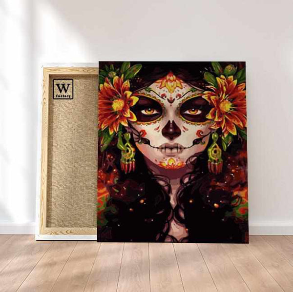 Première image de la peinture par numéro, Skull Girl , dans un cadre en bois sur du parquet.