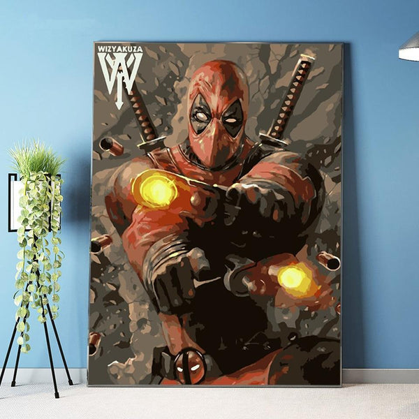 Première image de la peinture par numéro, Deadpool , dans un cadre en bois sur du parquet.