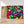 Charger l&#39;image dans la galerie, Première image de la peinture par numéro, Amas de Papillons , dans un cadre en bois sur du parquet.
