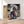 Charger l&#39;image dans la galerie, Première image de la peinture par numéro, Amoureux sous la Pluie , dans un cadre en bois sur du parquet.
