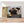Charger l&#39;image dans la galerie, Première image de la peinture par numéro, Carlin Gourmand , dans un cadre en bois sur du parquet.
