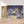 Charger l&#39;image dans la galerie, Première image de la peinture par numéro, Chalet Hivernal , dans un cadre en bois sur du parquet.

