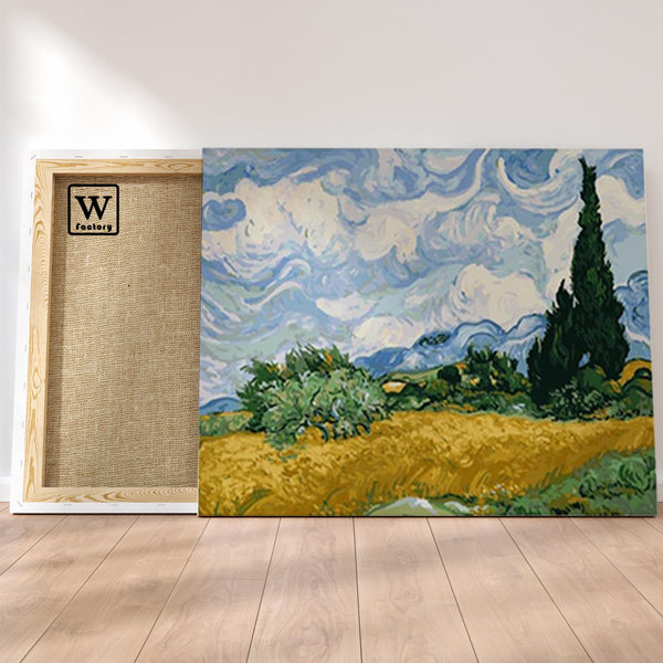 Première image de la peinture par numéro, Champ de Blé avec Cyprès , dans un cadre en bois sur du parquet.