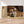 Charger l&#39;image dans la galerie, Première image de la peinture par numéro, Chiots Curieux , dans un cadre en bois sur du parquet.

