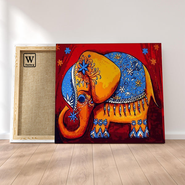 Première image de la peinture par numéro, Éléphant Indien , dans un cadre en bois sur du parquet.