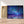 Charger l&#39;image dans la galerie, Première image de la peinture par numéro, Étoiles Exceptionnelles , dans un cadre en bois sur du parquet.
