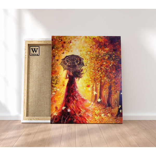 Première image de la peinture par numéro, Femme en Automne , dans un cadre en bois sur du parquet.