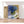 Charger l&#39;image dans la galerie, Première image de la peinture par numéro, Fleurs Bleues , dans un cadre en bois sur du parquet.
