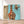 Charger l&#39;image dans la galerie, Première image de la peinture par numéro, Girafe Curieuse , dans un cadre en bois sur du parquet.
