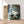 Charger l&#39;image dans la galerie, Première image de la peinture par numéro, Grues à Têtes Rouges , dans un cadre en bois sur du parquet.
