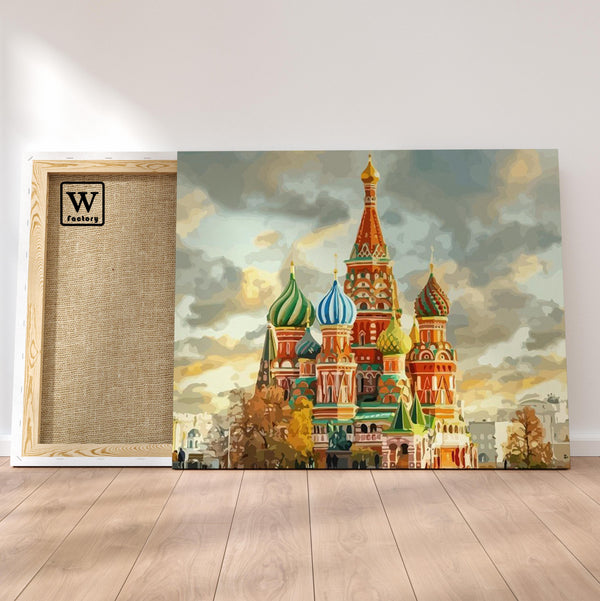 Première image de la peinture par numéro, Le Kremlin , dans un cadre en bois sur du parquet.