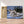 Charger l&#39;image dans la galerie, Première image de la peinture par numéro, Loups dans la Neige , dans un cadre en bois sur du parquet.
