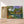 Charger l&#39;image dans la galerie, Première image de la peinture par numéro, Maison Perdue , dans un cadre en bois sur du parquet.
