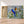 Charger l&#39;image dans la galerie, Première image de la peinture par numéro, Oiseaux Bleus , dans un cadre en bois sur du parquet.
