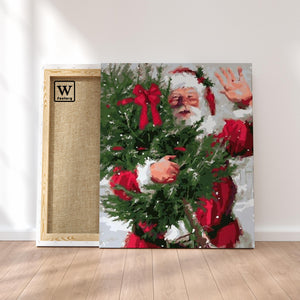 Première image de la peinture par numéro, Père Noël , dans un cadre en bois sur du parquet.
