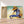 Charger l&#39;image dans la galerie, Première image de la peinture par numéro, Petite Fille et Coquillage , dans un cadre en bois sur du parquet.
