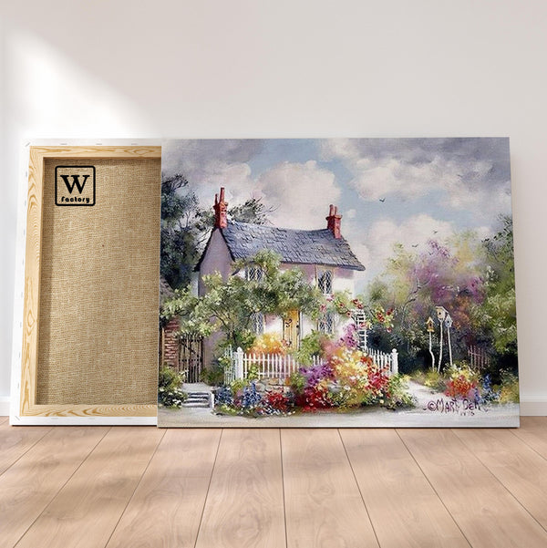 Première image de la peinture par numéro, Petite Maison Fleurie , dans un cadre en bois sur du parquet.