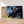 Charger l&#39;image dans la galerie, Première image de la peinture par numéro, Pianiste et ses Instruments , dans un cadre en bois sur du parquet.
