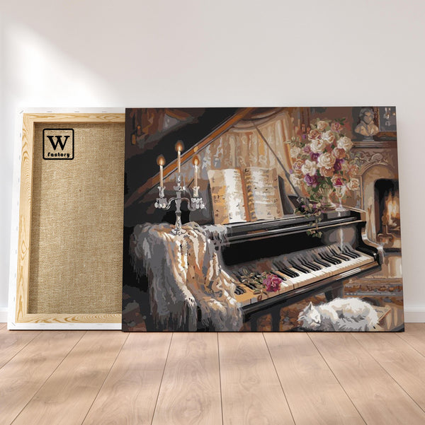 Première image de la peinture par numéro, Piano , dans un cadre en bois sur du parquet.