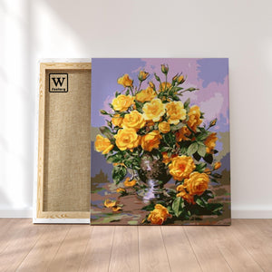 Première image de la peinture par numéro, Roses Jaunes , dans un cadre en bois sur du parquet.