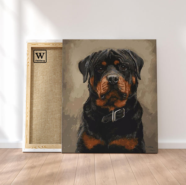 Première image de la peinture par numéro, Rottweiler , dans un cadre en bois sur du parquet.