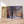 Charger l&#39;image dans la galerie, Première image de la peinture par numéro, Rue pour Noël , dans un cadre en bois sur du parquet.
