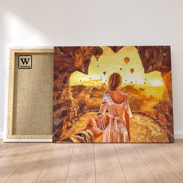 Première image de la peinture par numéro, Sortie d'une Grotte , dans un cadre en bois sur du parquet.