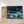 Charger l&#39;image dans la galerie, Première image de la peinture par numéro, Voiture Futuriste , dans un cadre en bois sur du parquet.
